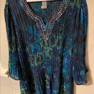 Beautiful blouse from Catherine’s. In a 1x 18/20.